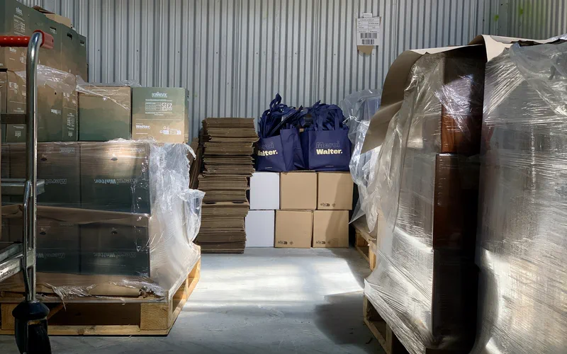 Boxes and palletised goods in a warehouse